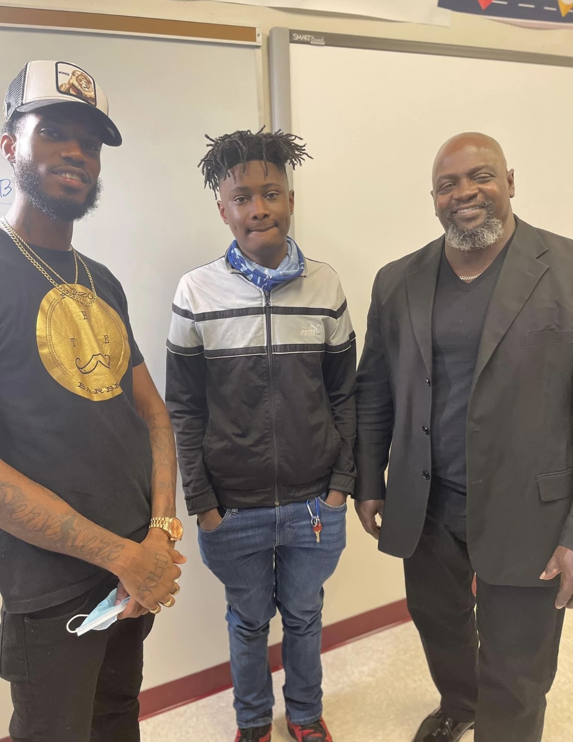 Carver students receiving free haircuts by the 2nd chance works program